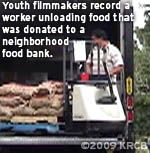  Youth filmmakers record a worker unloading food