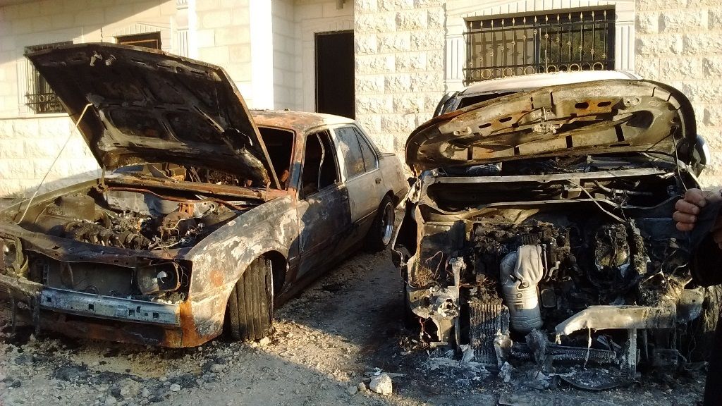 Palestinian cars burnt by settlers in the night sized